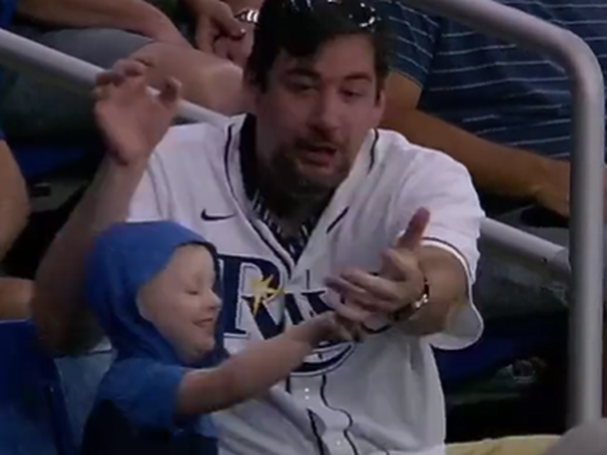 Young Phillies Fan Goes Viral After Giving Foul Ball To Crying Girl 