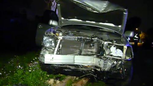 Woman wanted over stolen car crash into Melbourne property