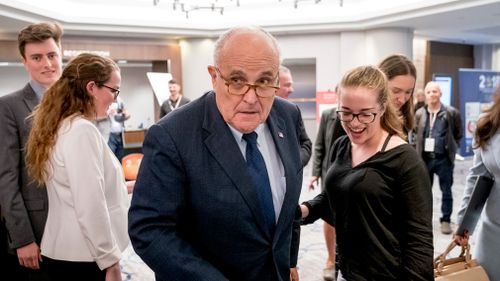 Giuliani has since dismissed as rumour his own statements about Mr Trump's payment to adult film actress Stormy Daniels. (AP)