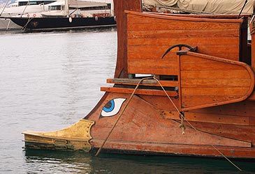 The trireme derived its name from what feature of the warship?