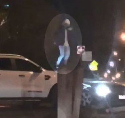 Video, obtained by 9NEWS, shows a man jumping up and down multiple times on the family car in Sunbury.

