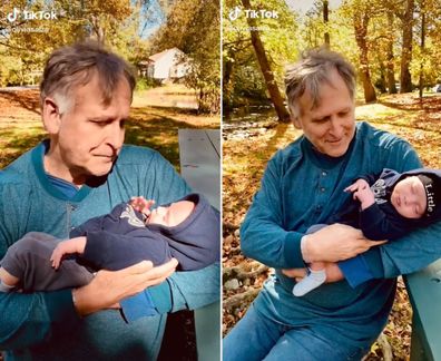 Grandad meeting his grandson for the first time. 