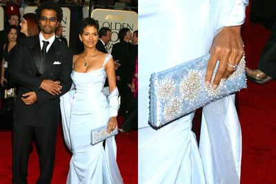 After two years of marriage, Eric and Halle called time on their relationship... filing for divorce twelve months later. <br/><br/>With Eric's infidelities the major cause of the marriage failure, no wonder the award-winning actress kept the <i>$100k</i> sparkler...