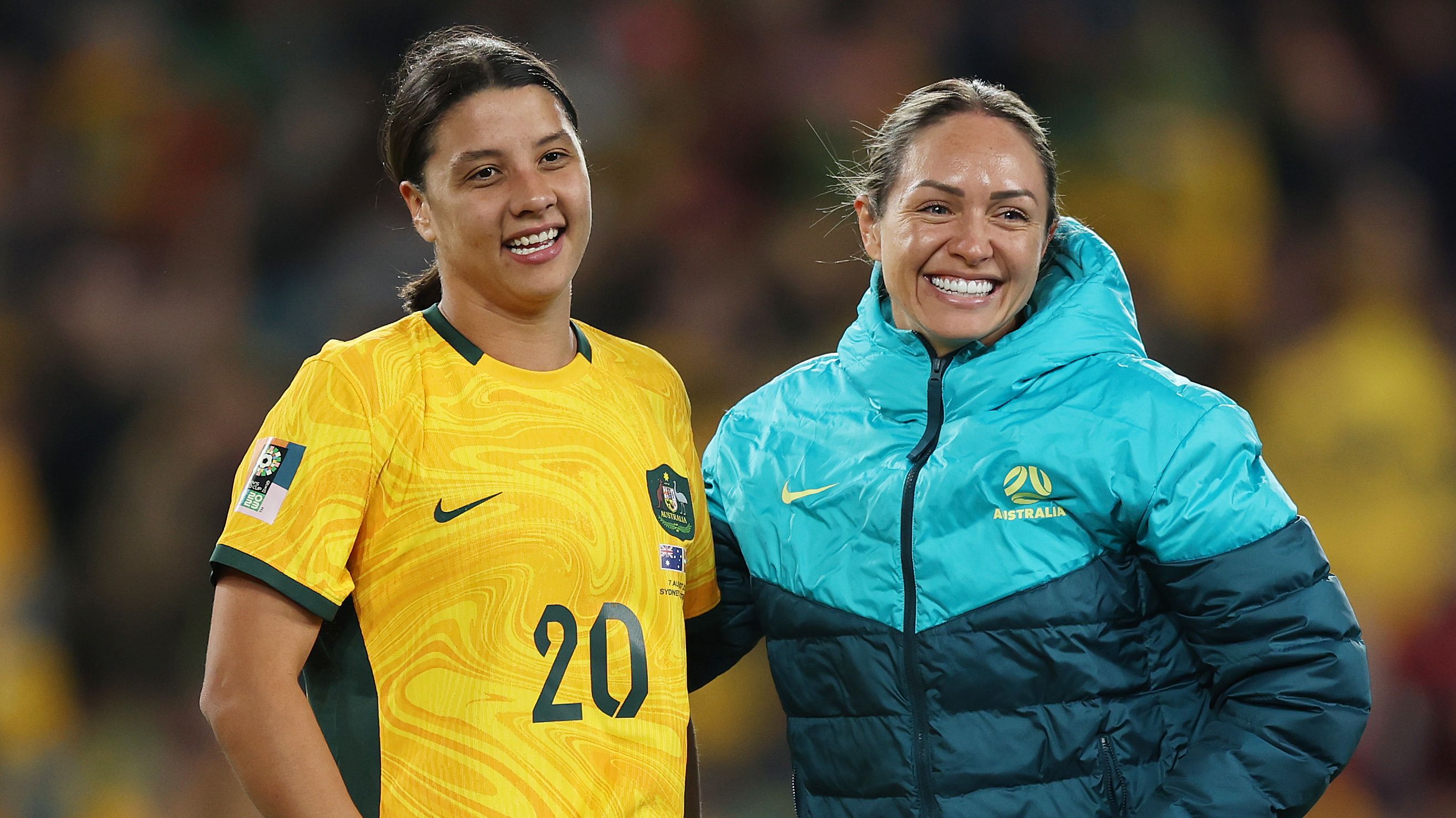 Sam Kerr (L) and Kyah Simon of Australia celebrate the teams 2-0 victory and advance to the quarter final during the FIFA Women&#x27;s World Cup Australia &amp; New Zealand 2023 Round of 16 match between Australia and Denmark at Stadium Australia on August 07, 2023 in Sydney, Australia. (Photo by Mark Metcalfe - FIFA/FIFA via Getty Images)