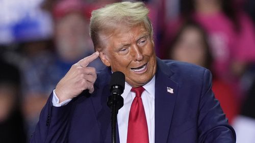 Republican presidential nominee former President Donald Trump speaks at a campaign rally at Van Andel Arena, Tuesday, Nov. 5, 2024, in Grand Rapids, Mich.