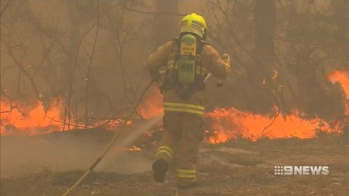 Firefighters have been battling rapid winds, at times in excess of 100km/h, and extremely dry land.