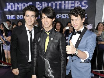 Musicians Kevin Jonas, Joe Jonas and Nick Jonas arrive at Walt Disney Picture's "Jonas Brothers: 3D Concert Experience"
