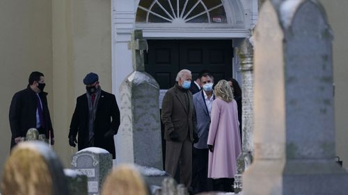 President-elect Joe Biden and his wife Jill Biden pause to talk with Ashley Biden and her husband Howard Krein as they walk from St. Joseph on the Brandywine Roman Catholic Church in Wilmington, Del., Friday, Dec. 18, 2020