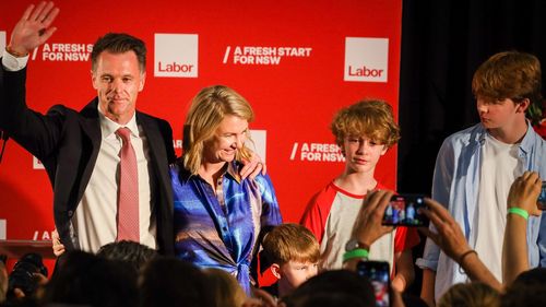 Chris Minns celebrates his election win with his family.