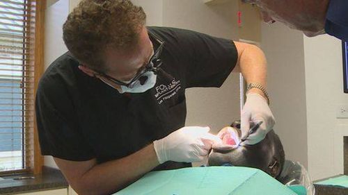 Local dentist Dr Fitzgerald fixed Mr Davis's teeth for him for free. (Facebook)