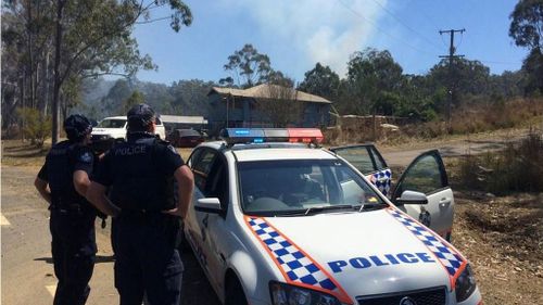 Police shut down the Burnett Highway after shots were fired. (9NEWS)