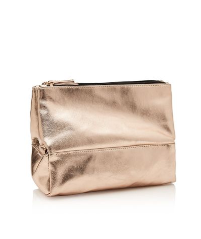 <a href="http://www.sportsgirl.com.au/jetsetter-travel-beauty-bag-gold-rose-gold-all" target="_blank">Sportsgirl Travel Beauty Bag in Gold, $24.95.<br>
</a>