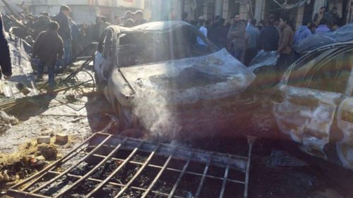 At least 60 people killed in twin blasts in Syrian capital of Damascus