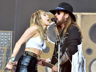 GLASTONBURY, ENGLAND - JUNE 30: Billy Ray Cyrus performs with Miley Cyrus on The Pyramid Stage during day five of Glastonbury Festival at Worthy Farm, Pilton on June 30, 2019 in Glastonbury, England. (Photo by Shirlaine Forrest/WireImage)