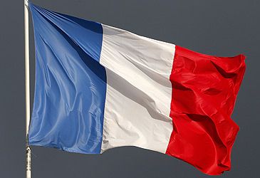 Emmanuel Macron has darkened which colour band on France's flag?