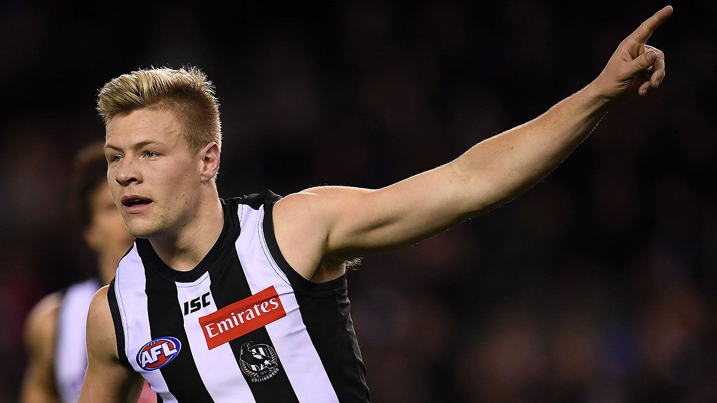 De Goey stars as Magpies down Lions in AFL