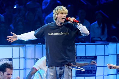 SANTA MONICA, CALIFORNIA - JUNE 21: mgk performs onstage during the Nickelodeon Kids' Choice Awards 2025 at Barker Hangar on June 21, 2025 in Santa Monica, California. (Photo by Rodin Eckenroth/Getty Images for Nickelodeon)