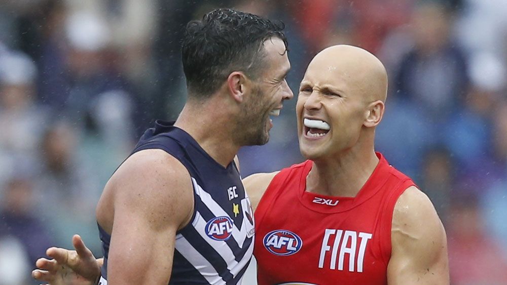 Ryan Crowley (l) and Gary Ablett. (AAP)