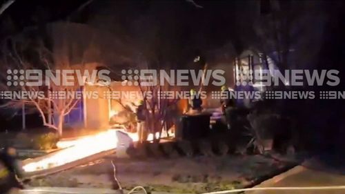 Neighbours were trapped outside for hours last night as fire crews battled the flames. Picture: 9NEWS