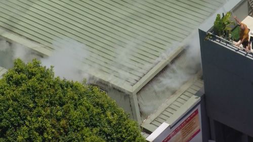 A﻿ fire has broken out at a parade of shops on Sydney's Northern Beaches.Fire crews rushed to Newport, north of Manly, ﻿at lunchtime, with reports of a fire in the roof of the Newport Village Arcade.