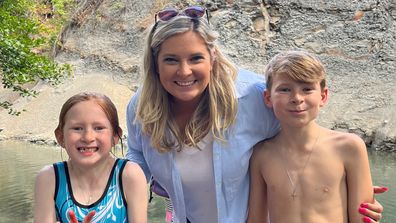 Anna Baker poses with her own children, Frankie (eight) and Luca (11).
