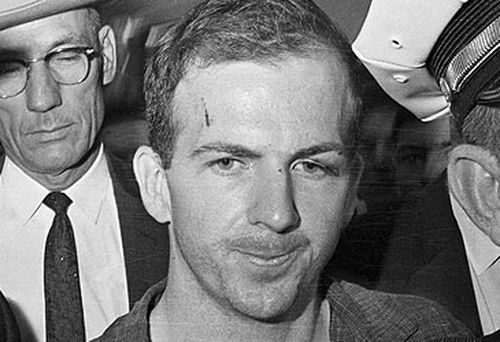 Lee Harvey Oswald with police (Getty)