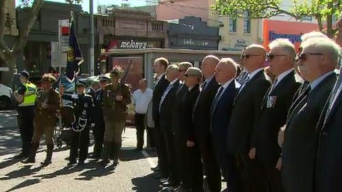 Dozens gathered at Prahran Police Station to remember Constable Tynan and Constable Eyre.