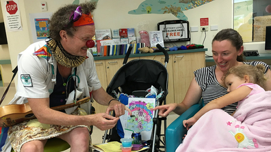 Emily in hospital with Clown Doctor