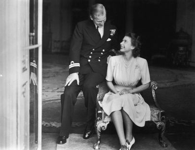 Princess Elizabeth (later Queen Elizabeth II) and her fiance, Philip Mountbatten at Buckingham Palace, after their engagement was announced, 10th July 1947.