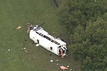 Eight people are dead and  dozens injured after a bus carrying farm workers crashed on a state highway in north-central Florida.