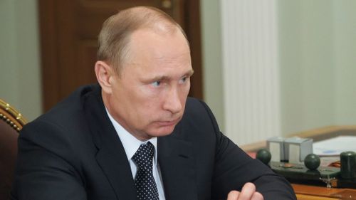 Putin calls for ceasefire in eastern Ukraine in aftermath of MH17 attack