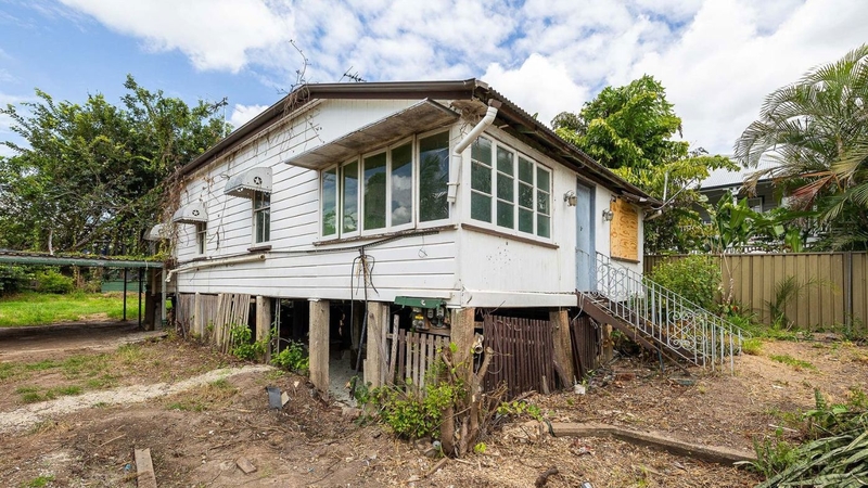 Who'd pay for a house without inspecting it? The buyer of this derelict Queenslander will have to