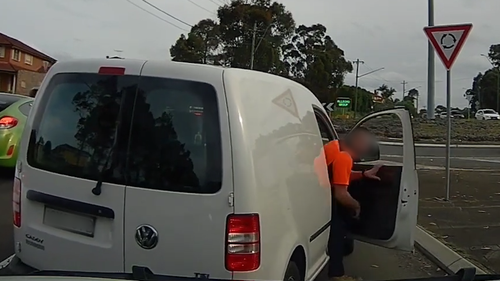 The driver of a ute has posted dash cam footage of a white van's prang on a Sydney road after an apparent dispute over who was in the wrong.