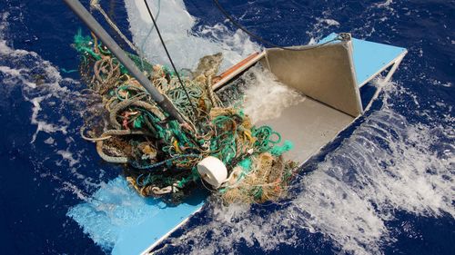 Abandoned nets, ropes and other plastic garbage are pulled out of the ocean at the Great Pacific Garbage Patch (GPGP), located halfway between Hawaii and California.