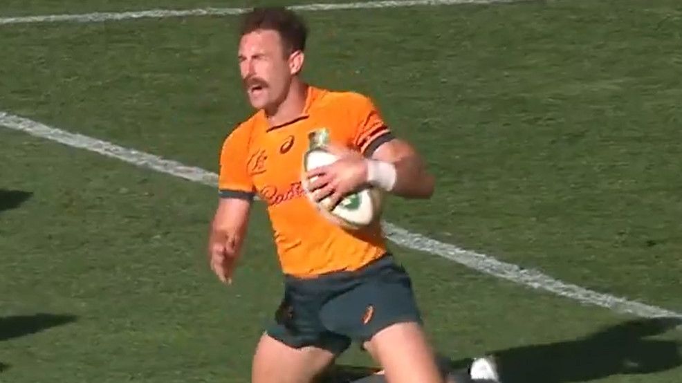 Wallabies halfback Nic White falls to the turf in Adelaide.