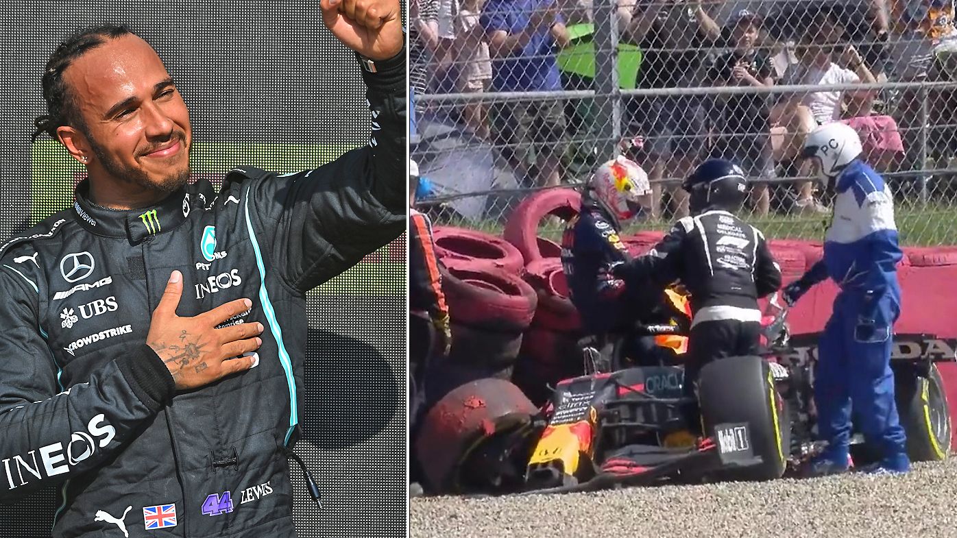 Lewis Hamilton celebrates as Max Verstappen crashes out