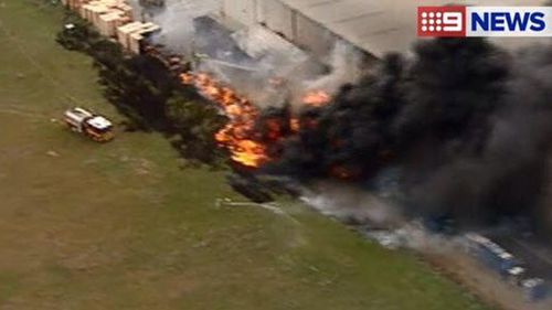 The blaze broke out at the Spotlight factory in Laverton, Victoria. (9NEWS)