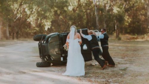 The couple soon jumped to help get their groomsman back on his feet. (RNC Photography via Facebook)