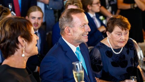 Tony Abbott (centre), Margie Abbott (left) and Fay Abbott during the wedding ceremony of Christine Forster and Virginia Edwards