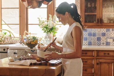 Meghan, the Duchess of Sussex, in her Montecito kitchen for a promotional image for her brand As ever, May 2025.