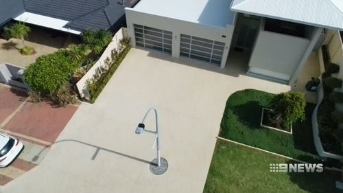 The lamp post was placed in the middle of the couple's driveway. (9NEWS)