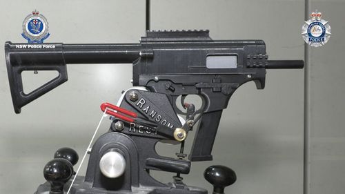 Two 3D-printed submachine guns were seized in raids by NSW Police.