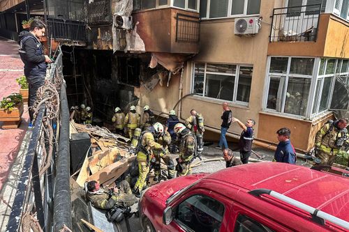 Firefighters work after a fire broke out at a nightclub in Istanbul, Turkey, Tuesday, April 2, 2024