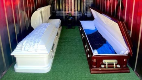 A Queensland man known as the "Coffin Confessor" is branching out into accommodation, offering campers the chance to sleep in a coffin for a night.