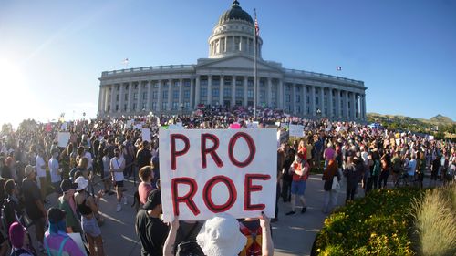 People attend an abortion-rights protest at the Utah State Capitol in Salt Lake City after the Supreme Court overturned Roe v. Wade.