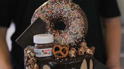 Recipe: <a href="http://kitchen.nine.com.au/2016/06/16/11/27/sugar-high-desserts-donut-oreo-and-nutella-layer-cake" target="_top">Sugar High Desserts' donut, Oreo and Nutella layer cake</a>