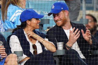 Prince Harry and Meghan Markle, the Duke and Duchess of Sussex, at Game 4 of baseball's World Series between the Los Angeles Dodgers and the Toronto Blue Jays in Los Angeles, Tuesday, Oct. 28, 2025. 
