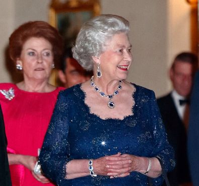 Lady Elizabeth and Queen Elizabeth leave the Ritz Hotel after attending a party to celebrate The Queen's Golden Jubilee on November 14, 2002.