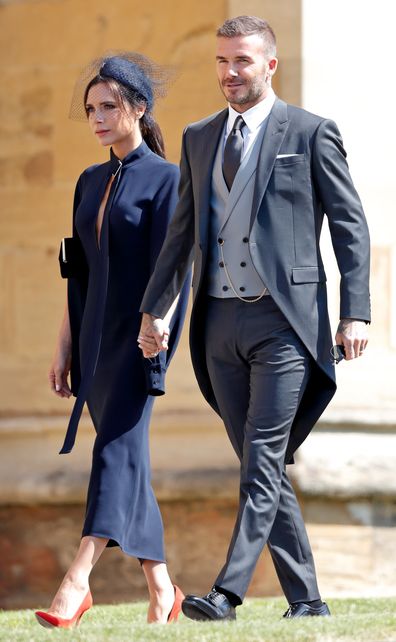 Victoria Beckham and David Beckham attend the wedding of Prince Harry to Ms Meghan Markle at St George's Chapel, Windsor Castle on May 19, 2018 in Windsor, England. 