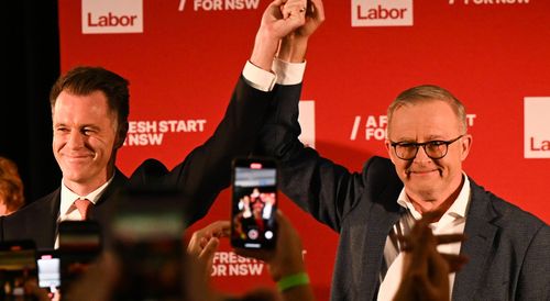 Labor leader Chris Minns with Prime Minister Anthony Albanese addresses his supporters at a reception at the Novotel Hotel in Brighton-Le-Sands, Sydney, after winning the NSW state election.